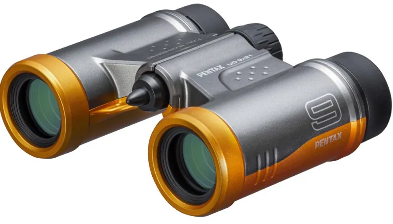 JUMELLES UD 9x21 GRIS ORANGE<PENTAX Store